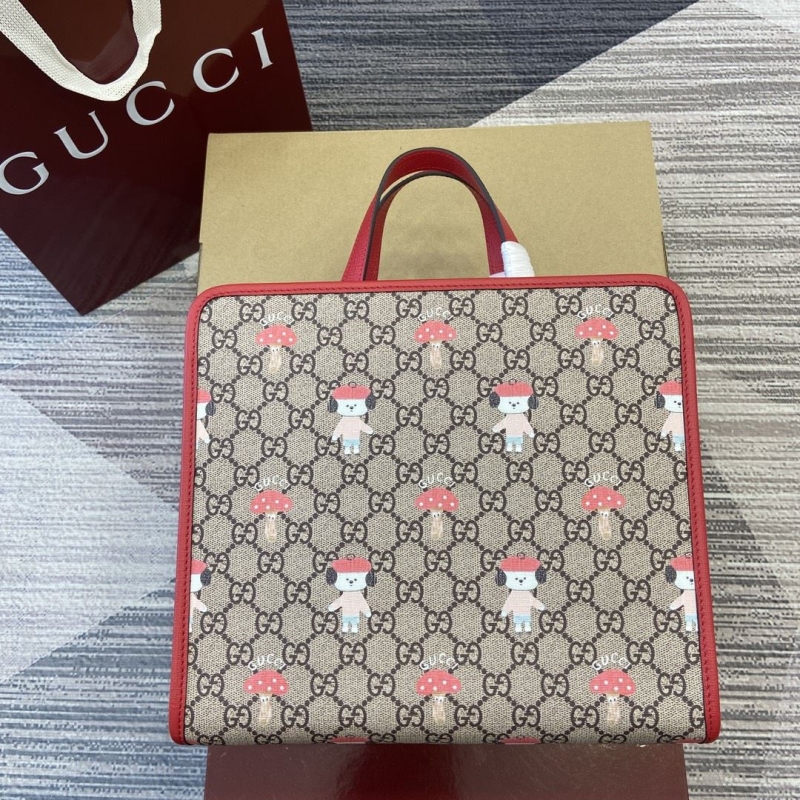 G*u*i shopping bags